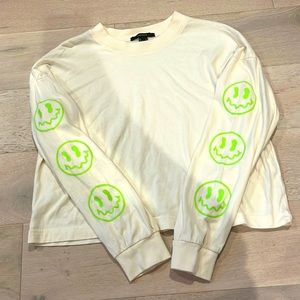 Cream and neon green smiley face cropped shirt